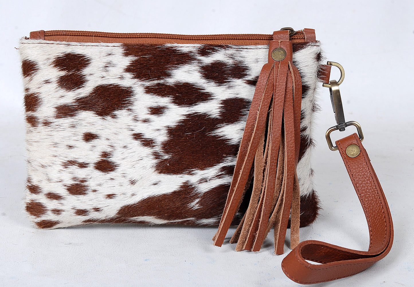 Cowhide Leather Wristlet Clutch with Tassel – Brown & White