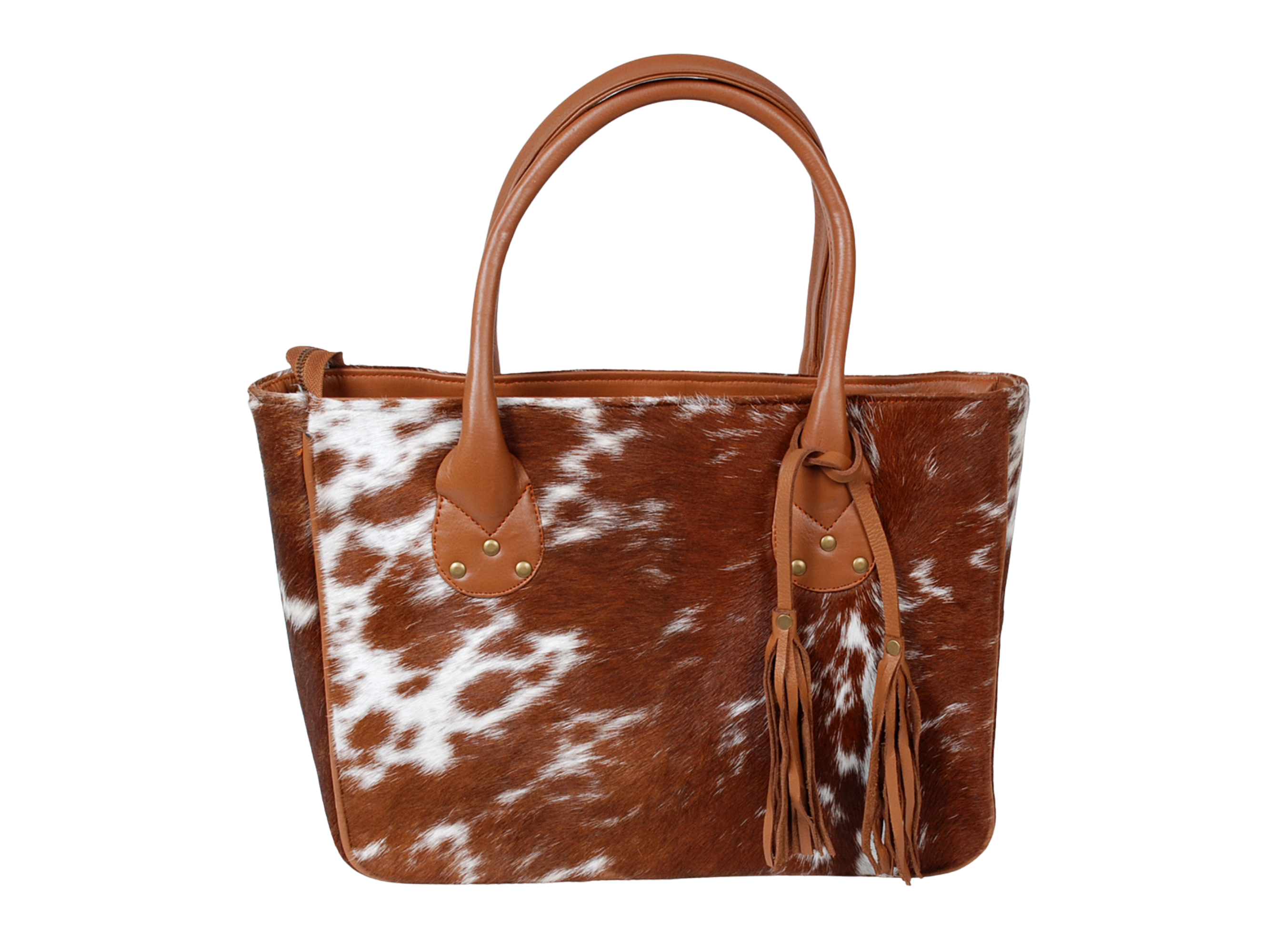 Brown and white cowhide tote bag with leather handle and tassels.