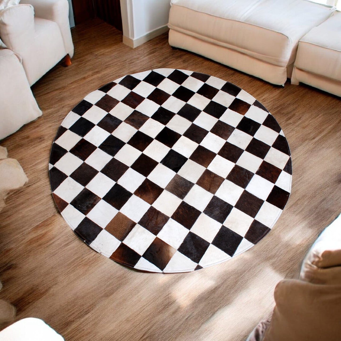 Handcrafted Round Cowhide Patchwork Rug – Black & White Checkered Design